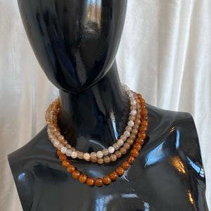 shades of amber necklace.  Triple staggered bead strands